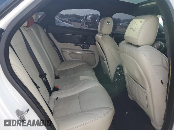2015 Jaguar XJ with VIN SAJWA1CZ9F8V88418, listed as a Copart auction lot 45547965 with 82,423 mi miles and Salvage Title. Bid and sale history available at carsss.com. Image 10.