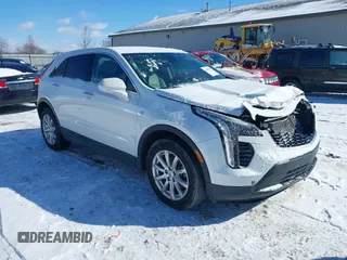 2019 Cadillac XT4 FWD Luxury with VIN 1GYAZAR4XKF170642, listed as a IAAI auction lot 41585684 with 74,512 mi miles. Bid and sale history available at carsss.com. Image 1.