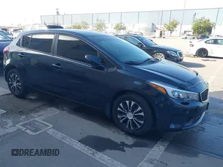 2017 Kia Forte5 LX with VIN KNAFK5A80H5696912, listed as a IAAI auction lot 41963104 with 97,009 mi miles. Bid and sale history available at carsss.com. Image 1.