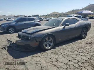 2019 Dodge Challenger SXT z VIN 2C3CDZAG0KH669695, wystawiony jako Copart lot #55287355 z przebiegiem 92 201 mil mil oraz Szkoda całkowita • Salvage title. Historia ofert i sprzedaży dostępna na DreamBid. Obrazek 1.