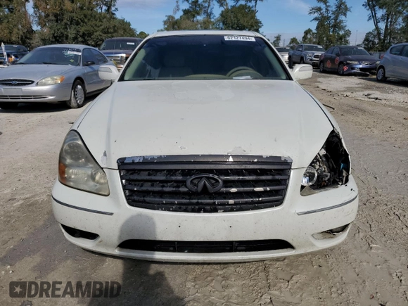 2005 Infiniti Q45 z VIN JNKBF01A85M100070, wystawiony jako Copart lot #82127494 z przebiegiem 176 578 mil mil oraz Szkoda całkowita • Salvage title. Historia ofert i sprzedaży dostępna na DreamBid. Obrazek 5.