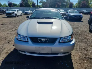 2000 Ford Mustang GT with VIN 1FAFP45X7YF265824, listed as a Copart auction lot 65204825 with 69,117 mi miles and Salvage title. Bid and sale history available at DreamBid. Image 5.