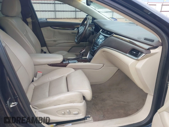 2013 Cadillac XTS Luxury with VIN 2G61P5S39D9182526, listed as a IAAI auction lot 42183995 with 132,778 mi miles. Bid and sale history available at carsss.com. Image 5.