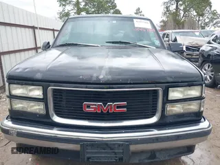 1998 GMC Yukon with VIN 1GKEC13R8WJ711255, listed as a IAAI auction lot 41457304 with 291,211 mi miles. Bid and sale history available at carsss.com. Image 12.