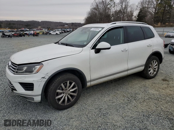 2015 Volkswagen Touareg Lux с VIN WVGEP9BP2FD002247, выставлен на аукционе Copart как лот 41924615 с пробегом 127 543 миль миль и Списание • Salvage title. История ставок и продаж доступна на DreamBid. Изображение 1.