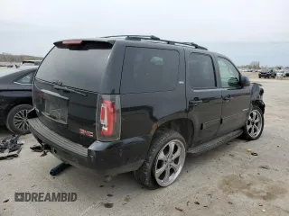 2009 GMC Yukon SLT 4SB with VIN 1GKFK33009R280856, listed as a Copart auction lot 51522635 with 265,941 mi miles and Salvage Title. Bid and sale history available at DreamBid. Image 3.