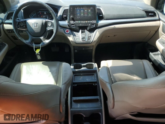 2019 Honda Odyssey Touring with VIN 5FNRL6H86KB089055, listed as a Copart auction lot 56980975 with 154,842 mi miles and Salvage title. Bid and sale history available at DreamBid. Image 8.