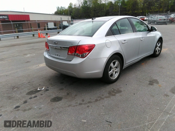 2014 Chevrolet Cruze 1LT z VIN 1G1PC5SB7E7249503, wystawiony jako IAAI lot #42005106 z przebiegiem 91 917 mil mil oraz . Historia ofert i sprzedaży dostępna na DreamBid. Obrazek 4.