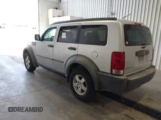 2007 Dodge Nitro SXT z VIN 1D8GT28K17W615978, wystawiony jako IAAI lot #41955211 z przebiegiem 142 741 mil mil oraz . Historia ofert i sprzedaży dostępna na DreamBid. Obrazek 3.