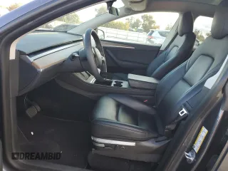 2023 Tesla Model Y Long Range with VIN 7SAYGDEE9PF638742, listed as a Copart auction lot 48188455 with 30,550 mi miles and Salvage Title. Bid and sale history available at DreamBid. Image 7.