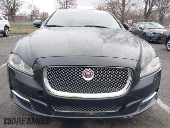 2014 Jaguar XJ with VIN SAJWA1CZ0E8V73966, listed as a IAAI auction lot 41887234 with 120,804 mi miles and . Bid and sale history available at DreamBid. Image 12.