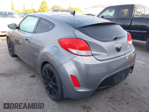 2012 Hyundai Veloster w/Gray Int z VIN KMHTC6AD1CU082872, wystawiony jako IAAI lot #41980406 z przebiegiem 132 804 mil mil oraz . Historia ofert i sprzedaży dostępna na DreamBid. Obrazek 3.