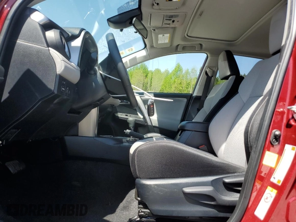 2018 Toyota RAV4 XLE with VIN JTMWFREV7JD119143, listed as a Copart auction lot 52576915 with 56,947 mi miles and Salvage Title. Bid and sale history available at carsss.com. Image 7.