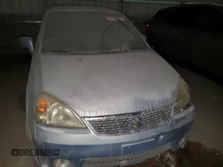 2005 Suzuki Aerio S z VIN JS2RA61SX55250286, wystawiony jako Copart lot #73859164 z przebiegiem 120 033 mil mil oraz Nie do naprawy. Historia ofert i sprzedaży dostępna na DreamBid. Obrazek 5.