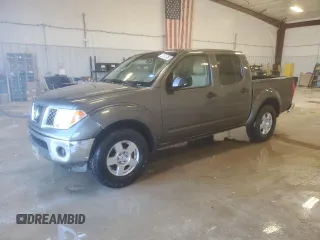 2007 Nissan Frontier SE z VIN 1N6AD07UX7C448592, wystawiony jako Copart lot #46858515 z przebiegiem 255 950 mil mil oraz Czysty tytuł • Clean title. Historia ofert i sprzedaży dostępna na DreamBid. Obrazek 1.