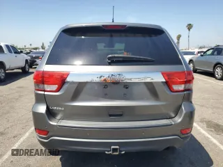 2012 Jeep Grand Cherokee Laredo with VIN 1C4RJEAG0CC104004, listed as a Copart auction lot 53734675 with 150,216 mi miles and Salvage Title. Bid and sale history available at carsss.com. Image 6.