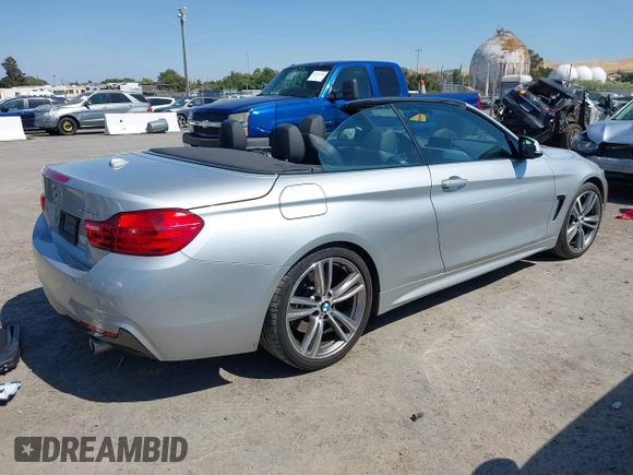 2014 BMW 4 Series 435i with VIN WBA3T3C54EJ877196, listed as a IAAI auction lot 42755387 with 113,172 mi miles and . Bid and sale history available at DreamBid. Image 4.