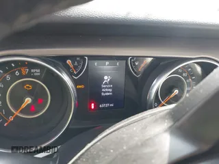 2020 Jeep Wrangler Sport S с VIN 1C4GJXAG3LW275413, выставлен на аукционе IAAI как лот 41884921 с пробегом 63 727 миль миль и . История ставок и продаж доступна на DreamBid. Изображение 7.