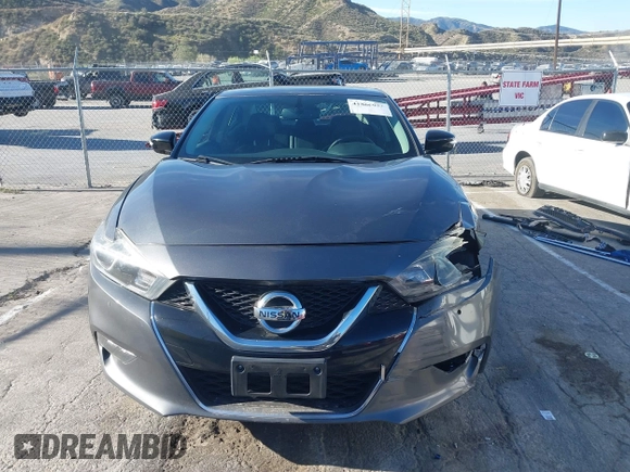2018 Nissan Maxima Platinum z VIN 1N4AA6AP7JC392710, wystawiony jako IAAI lot #41866951 z przebiegiem 49 026 mil mil oraz . Historia ofert i sprzedaży dostępna na DreamBid. Obrazek 12.