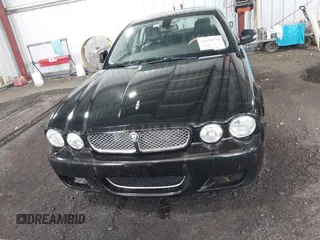 2009 Jaguar XJ 8 LWB with VIN SAJWA79B29SH31572, listed as a IAAI auction lot 42138154 with 147,500 mi miles and . Bid and sale history available at DreamBid. Image 12.