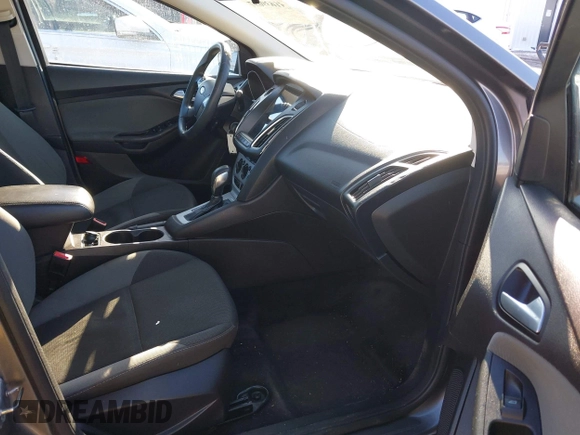 2013 Ford Focus SE z VIN 1FADP3F28DL206541, wystawiony jako IAAI lot #41639697 z przebiegiem 109 828 mil mil oraz . Historia ofert i sprzedaży dostępna na DreamBid. Obrazek 5.