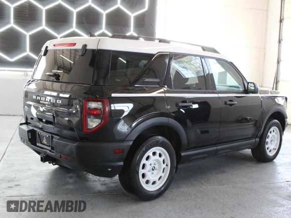 2023 Ford Bronco Sport Heritage z VIN 3FMCR9G60PRE07470, wystawiony jako Copart lot #60569615 z przebiegiem 16 236 mil mil oraz Szkoda całkowita • Salvage title. Historia ofert i sprzedaży dostępna na DreamBid. Obrazek 3.