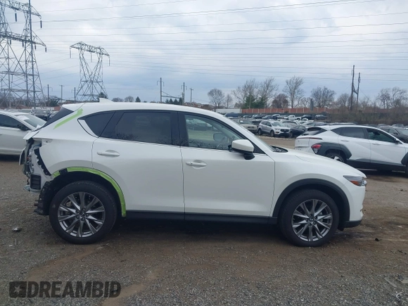2020 Mazda CX-5 Grand Touring with VIN JM3KFBDM5L0731373, listed as a IAAI auction lot 41900567 with 31,268 mi miles and . Bid and sale history available at DreamBid. Image 13.