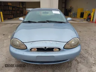 1997 Mercury Sable LS z VIN 1MELM53S0VG648365, wystawiony jako IAAI lot #41501814 z przebiegiem 256 352 mil mil oraz . Historia ofert i sprzedaży dostępna na DreamBid. Obrazek 6.
