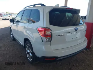 2018 Subaru Forester Touring z VIN JF2SJAWC6JH580632, wystawiony jako IAAI lot #42237986 z przebiegiem 38 446 mil mil oraz . Historia ofert i sprzedaży dostępna na DreamBid. Obrazek 3.