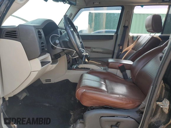 2007 Jeep Commander Limited z VIN 1J8HG58P27C520330, wystawiony jako Copart lot #54595745 z przebiegiem 168 908 mil mil oraz Szkoda całkowita • Salvage title. Historia ofert i sprzedaży dostępna na DreamBid. Obrazek 7.