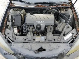 2005 Pontiac Grand Prix z VIN 2G2WP522851195623, wystawiony jako Copart lot #52716385 z przebiegiem 266 660 mil mil oraz Czysty tytuł • Clean title. Historia ofert i sprzedaży dostępna na DreamBid. Obrazek 11.