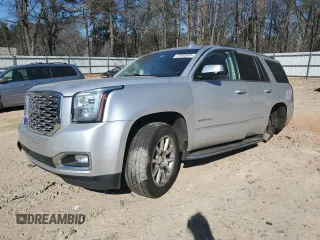 2018 GMC Yukon Denali with VIN 1GKS1CKJ0JR241040, listed as a Copart auction lot 47592655 with 133,737 mi miles and Salvage Title. Bid and sale history available at carsss.com. Image 1.