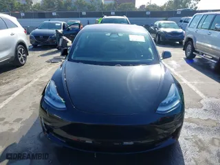 2019 Tesla Model 3 Long Range with VIN 5YJ3E1EB9KF186737, listed as a IAAI auction lot 42022761 with 43,742 mi miles. Bid and sale history available at carsss.com. Image 12.