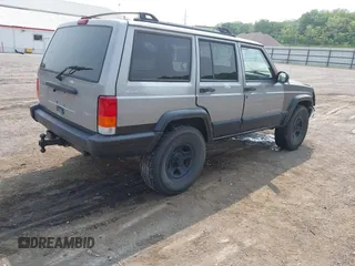 2000 Jeep Cherokee with VIN 1J4FF48S5YL159414, listed as a IAAI auction lot 42416639 with 177,932 mi miles and . Bid and sale history available at DreamBid. Image 4.