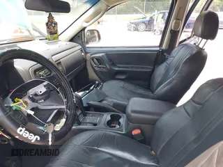 2004 Jeep Grand Cherokee with VIN 1J8GW48N94C135866, listed as a IAAI auction lot 42419888 with 326,880 mi miles and . Bid and sale history available at DreamBid. Image 5.