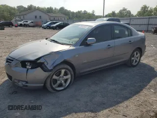 2005 Mazda 3 s with VIN JM1BK323251316822, listed as a Copart auction lot 59265565 with 184,611 mi miles and Salvage title. Bid and sale history available at DreamBid. Image 1.