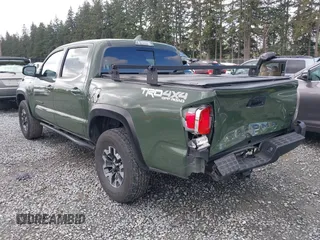 2021 Toyota Tacoma 4WD SR with VIN 3TMCZ5AN5MM437358, listed as a IAAI auction lot 42000234 with 47,295 mi miles. Bid and sale history available at carsss.com. Image 3.