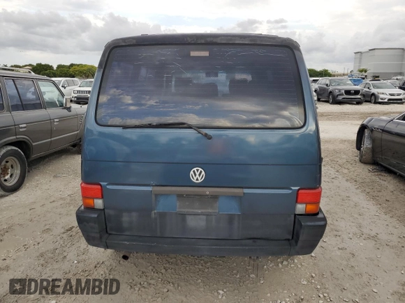 1993 Volkswagen EuroVan с VIN WV2MC0707PH010911, выставлен на аукционе Copart как лот 78414594 с пробегом 191 174 миль миль и Чистый • Clean title. История ставок и продаж доступна на DreamBid. Изображение 6.