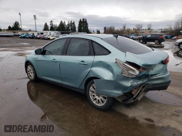2012 Ford Focus SE with VIN 1FAHP3F21CL142407, listed as a Copart auction lot 48551205 with 174,935 mi miles and Salvage Title. Bid and sale history available at carsss.com. Image 2.