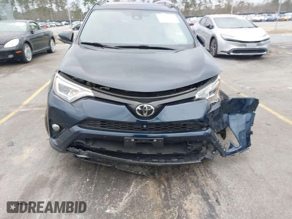 2017 Toyota RAV4 SE with VIN JTMJFREV0HD200683, listed as a IAAI auction lot 41595927 with 109,981 mi miles and . Bid and sale history available at DreamBid. Image 12.