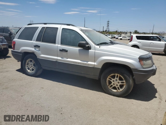 2002 Jeep Grand Cherokee Laredo with VIN 1J4GW48S52C242434, listed as a Copart auction lot 62859835 with 171,342 mi miles and Clean title. Bid and sale history available at DreamBid. Image 4.