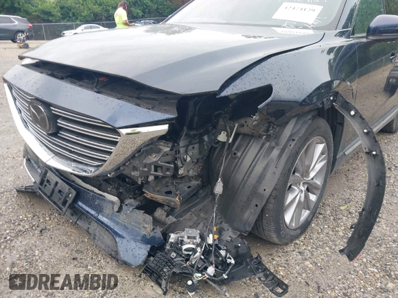 2021 Mazda CX-9 Carbon Edition z VIN JM3TCBDY7M0536005, wystawiony jako IAAI lot #42424129 z przebiegiem 48 005 mil mil oraz . Historia ofert i sprzedaży dostępna na DreamBid. Obrazek 6.