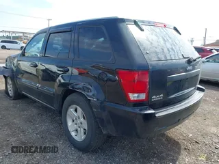 2008 Jeep Grand Cherokee Laredo with VIN 1J8GR48K48C119836, listed as a IAAI auction lot 42114083 with 129,352 mi miles. Bid and sale history available at carsss.com. Image 3.