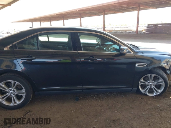 2014 Ford Taurus SEL with VIN 1FAHP2E82EG153430, listed as a IAAI auction lot 42022188 with 193,947 mi miles and . Bid and sale history available at DreamBid. Image 13.