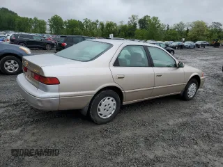 1997 Toyota Camry LE z VIN 4T1BG22K3VU819353, wystawiony jako Copart lot #58141275 z przebiegiem 32 935 mil mil oraz Czysty tytuł • Clean title. Historia ofert i sprzedaży dostępna na DreamBid. Obrazek 3.