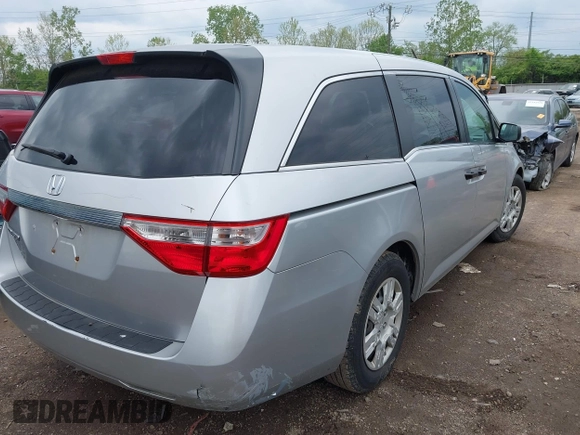 2012 Honda Odyssey LX with VIN 5FNRL5H22CB110569, listed as a IAAI auction lot 42151633 with 253,812 mi miles and . Bid and sale history available at carsss.com. Image 4.