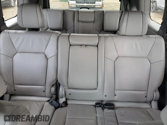2013 Honda Pilot Touring z VIN 5FNYF4H91DB062722, wystawiony jako Copart lot #58308165 z przebiegiem 130 896 mil mil oraz Szkoda całkowita • Salvage title. Historia ofert i sprzedaży dostępna na DreamBid. Obrazek 10.