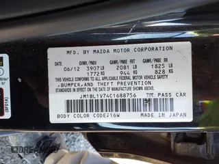 2012 Mazda 3 i Touring with VIN JM1BL1V74C1688756, listed as a IAAI auction lot 41421015 with 132,886 mi miles. Bid and sale history available at carsss.com. Image 9.
