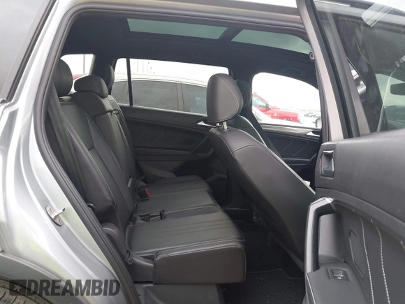 2022 Volkswagen Tiguan SE R-Line Black with VIN 3VVCB7AXXNM165748, listed as a IAAI auction lot 42178772 with 64,007 mi miles and . Bid and sale history available at DreamBid. Image 8.