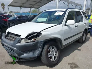 2002 Honda CR-V EX with VIN JHLRD78852C095223, listed as a IAAI auction lot 41812856 with 234,219 mi miles and . Bid and sale history available at DreamBid. Image 2.